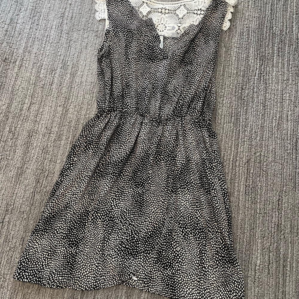 Tulip front black and cream patterned dress with cream color lace